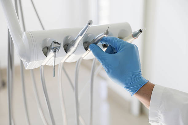 Professional Tooth Extraction technician working in Washburn, ND